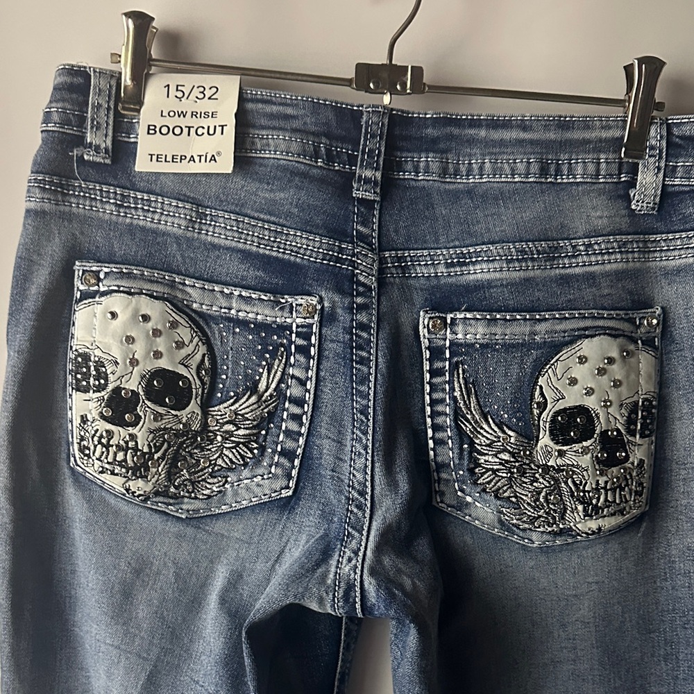 Telepatía Women's Blue low rise Boot Cut Jeans embroidered skull w: rhinestones